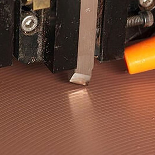 Dispositivo de corrección de placa de vuelta